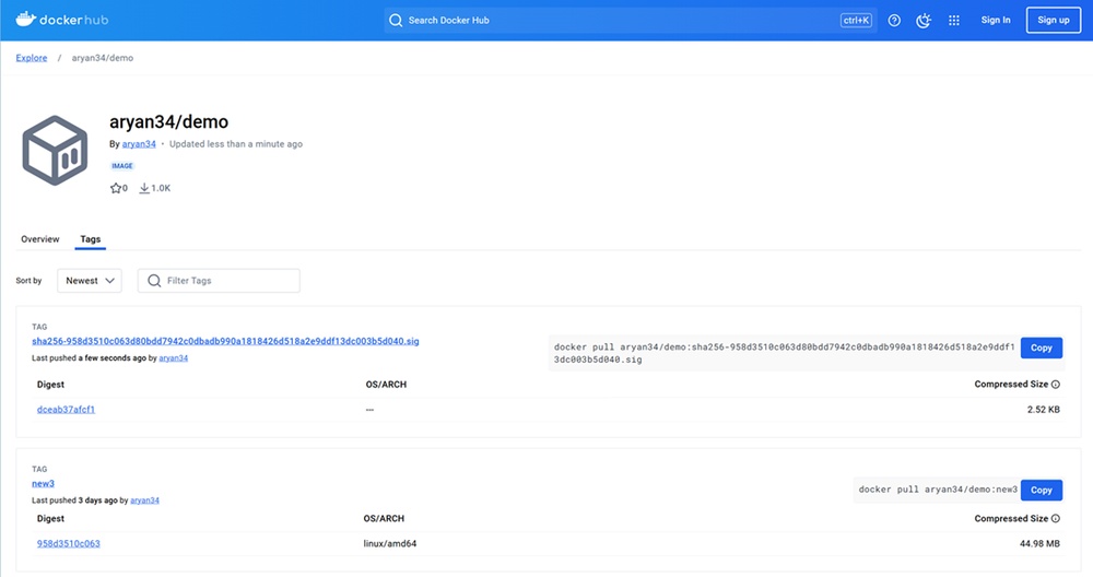 Docker Hub account showing the new signature artifact alongside the image